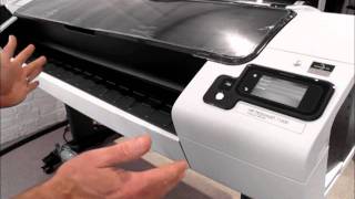 HP Designjet T1300 printer  how to load rolls of media [upl. by Eissalc991]