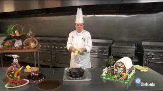 Learn how to make and professionally decorate chocolate flourless cake [upl. by Oibesue458]