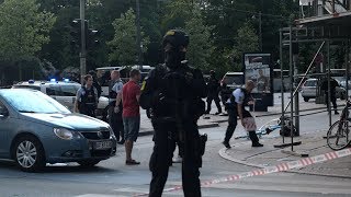 Man shot by police in central Copenhagen  news report from scene [upl. by Trellas]