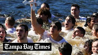 The cross goes to George Stamas 16 at Epiphany dive in Tarpon Springs [upl. by Eesyak414]