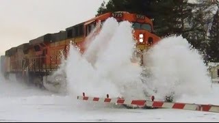 BNSF Train Crashes Through Big Snowdrift [upl. by Anwahsit]