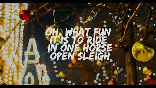 Michael Bublé  Jingle Bells ft The Puppini Sisters Lyrics [upl. by Philpot]