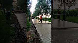 Cement pavement anti skid treatment process [upl. by Atnauqahs]