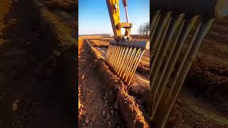 The process of loosening the soil with an excavator rake [upl. by Bailey188]