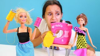 Barbie video Terzi Barbie elbiseleri karıştırıyor Kukla giydirme oyunu [upl. by Otter]