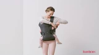 How to place your child on your back in BABYBJÖRN Baby Carrier One – tutorial [upl. by Eneliak]