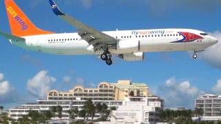 Sunwing 737 Landing at St Maarten CABIN  BEACH views [upl. by Eirehs]