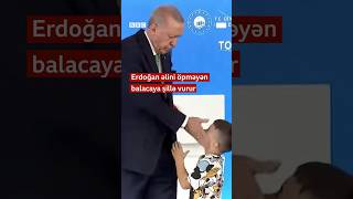 Erdoğan əlini öpməyən balacaya şillə vurur [upl. by Haleemak]