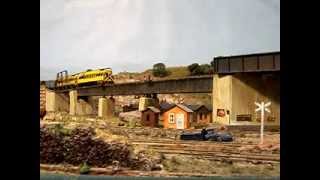 Virginian Railway Fairbanks Morse Train Master diesels lead a freight across a bridge [upl. by Anahsohs723]