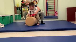 NDT therapy to a quadriplegic dystonic child with CP Roll therapy for sitting position [upl. by Henden457]