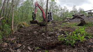 Excavator spreading 200 tons of dirt and clay on a rainy day timelapse [upl. by Neerhtak]