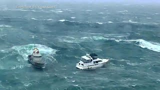 US Coast Guard rescues man wanted by police before massive wave capsizes boat [upl. by Lardner]