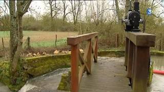 Un vieux moulin qui produit de lélectricité [upl. by Tupler]