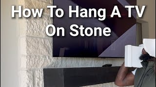 How to hang a tv on stone full video [upl. by Sonnnie]