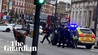 Streatham police arrive on the scene after man shot by armed officers in terror incident [upl. by Ynohtnaed550]