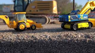 Construction toys  Hot wheels Matchbox and NORSCOT CAT 966G Wheel Loader at construction site￼ [upl. by Cruce]