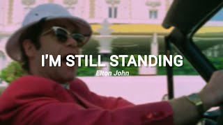 Elton John  Im Still Standing LYRICS [upl. by Nova25]