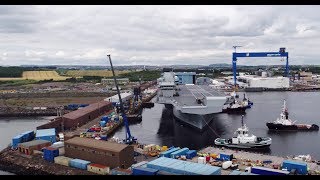 Drone footage of HMS Queen Elizabeth leaving the basin at Rosyth [upl. by Akkimat]