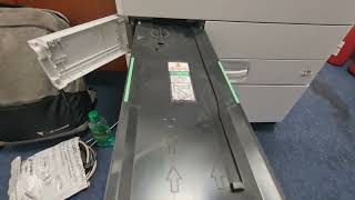 How to Clean the Toner Waste Container on Ricoh M C2000 Printer [upl. by Idieh156]