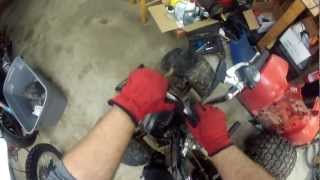 1986 Honda TRX 125 Dash and Ignition Removal [upl. by Atsahs288]