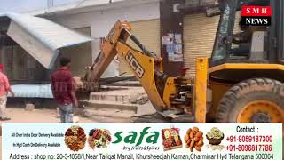 Ghmc town planning officials demolishing the buildings standing on the footpaths in Rajendranagar [upl. by Roi]