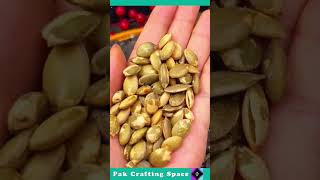 The Process Of Roasting Open Black Pumpkin Seeds [upl. by Nada]