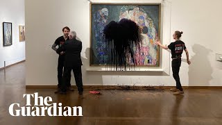 Climate activists throw black liquid at Gustav Klimt painting in Vienna [upl. by Appel]