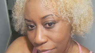 OGN Vlog  Prt1 Bleaching my afro with Garnier Nutrisse Ultra Bleach D4 and Creme of Nature C43 [upl. by Adekram]