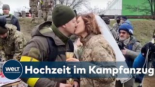 FRONT STATT FLITTERWOCHEN Ukrainisches Paar gibt sich mitten im Kampfgebiet das JaWort [upl. by Ylsew]