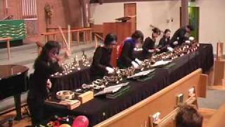 Kiriku playing Plink Plank Plunk by Leroy Andersen on Handbells [upl. by Annaes]