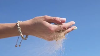 Hand Releasing Sand Stock Video [upl. by Khudari859]