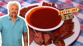 Guy Fieri Sees How the Sausage Is Made at TBone Toms  Diners DriveIns and Dives  Food Network [upl. by Calisa]