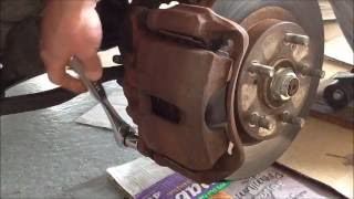 Changing warped rotors on 1998 Honda Accord [upl. by Dragelin]