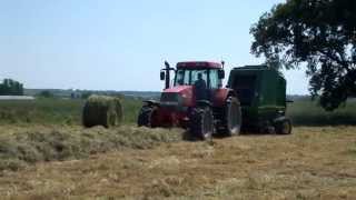 pessage de foin 2014 avec mccormick mtx 110 et presse john deere 592 [upl. by Shulock]