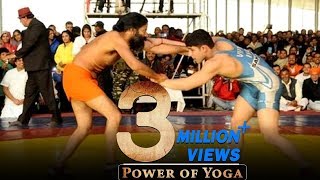 Swami Ramdev Shows his Power of Yoga in the Wrestling  Must Watch [upl. by Anwahsed327]