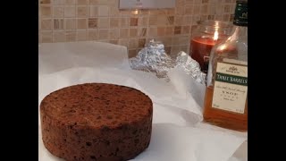 Feeding Your Christmas Cake with Brandy  Traditional British Christmas Cake [upl. by Darmit]