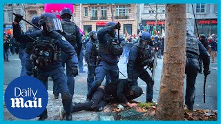 France protests French riot police attack protesters with batons amid pension reform announcement [upl. by Deryl]