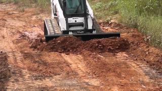 Skid Pro Skid Steer 6 Way Dozer Blade Demo [upl. by Lebiram]