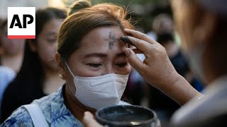 Catholics in the Philippines mark Ash Wednesday with cross of ashes on foreheads [upl. by Happ517]