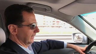 Assad filmed driving himself to the front lines of Syrian civil war [upl. by Yojal350]