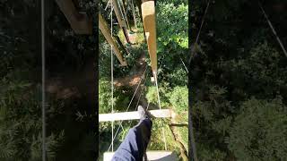 Man crosses rotating steps on high bridge in Foshan China [upl. by Sirah91]