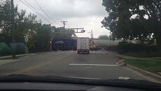 Elkhart Western 911 and Patriot rail 802 crossing Main Street in Elkhart [upl. by Reppep972]