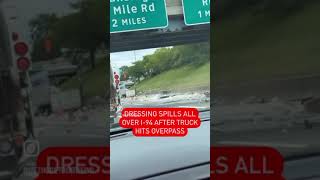 Dressing spills all over I94 after truck HITS OVERPASS [upl. by Roddy]