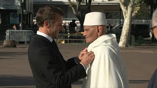 À Bastia Macron décore le dernier tirailleur marocain encore en vie  AFP Images [upl. by Noiro]