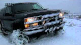 Lifted Monster Chevy Truck crawling in the snow [upl. by Salamanca]