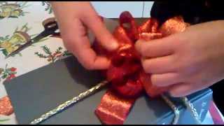 Come fare un fiocco regalo How to make a bow mp4 [upl. by Dorri901]