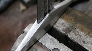 Forging a Damascus sword part 3 making the crossguard and pommel [upl. by Retxab542]