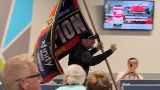 Dale Earnhardt Jr Runs into Media Center with Championship Flag quotWere Going Full Throttlequot [upl. by Novaelc]