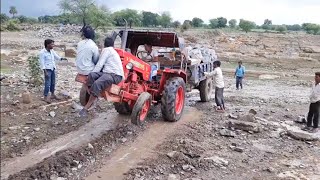 Mahindra B275di tractor Badly Stuck with fully loaded Trolley Rescue by villagers [upl. by Nnaaihtnyc]