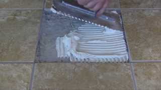 LATICRETE Pro Tips How to Remove and Replace a Chipped or Broken Tile [upl. by Misab595]